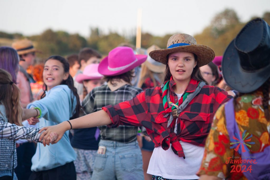 Participants taking part in a barn dance