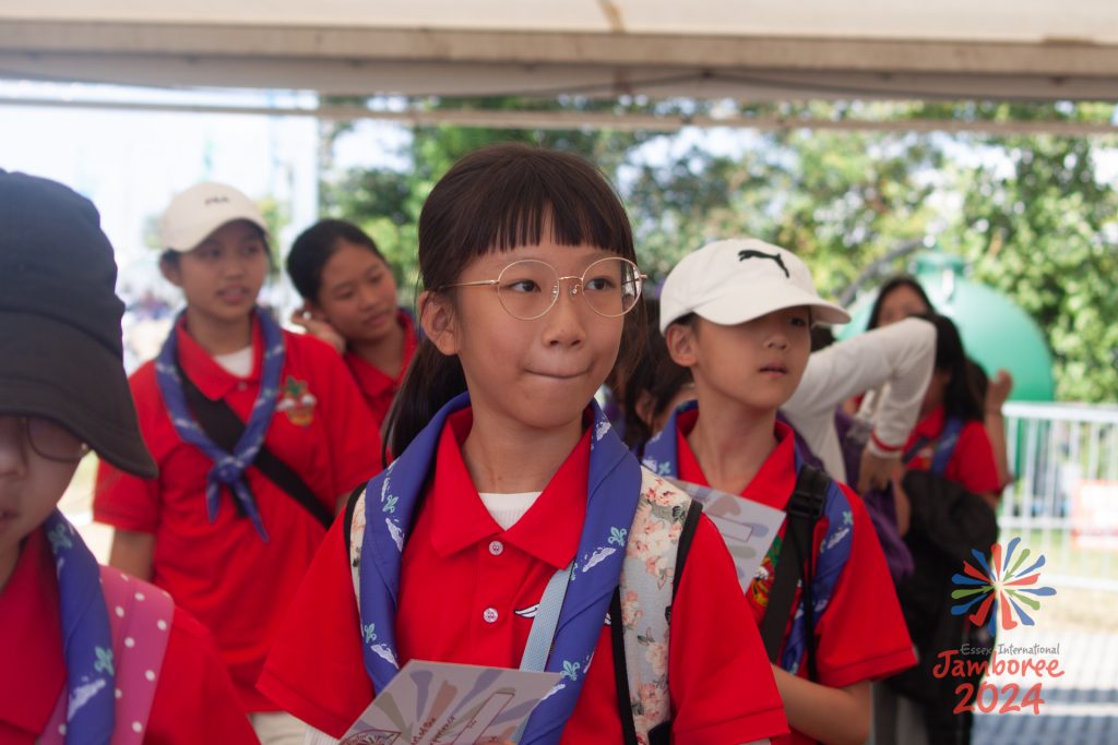 Some Scouts from Hong Kong walking through the EIJ 2024 main gate. 