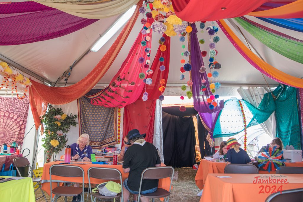 Inside the Ganges subcamp hub - there are colourful drapes hanging from the ceiling