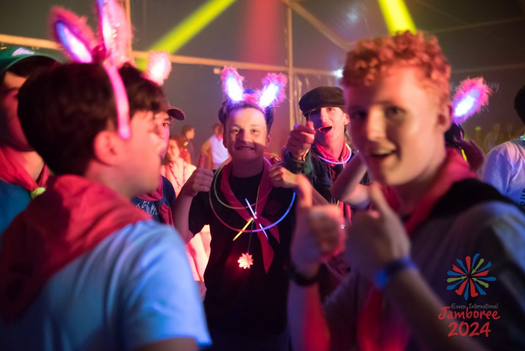 Some Scouts wearing light-up rabbit ears in the House of Music.