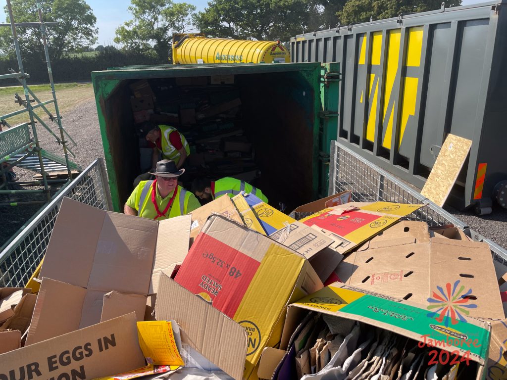 The Dry Waste Team sort through a collection of cardboard waste