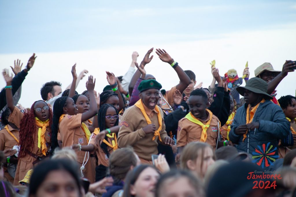 A group of young people taking part in their subcamp dance during the opening ceremony.