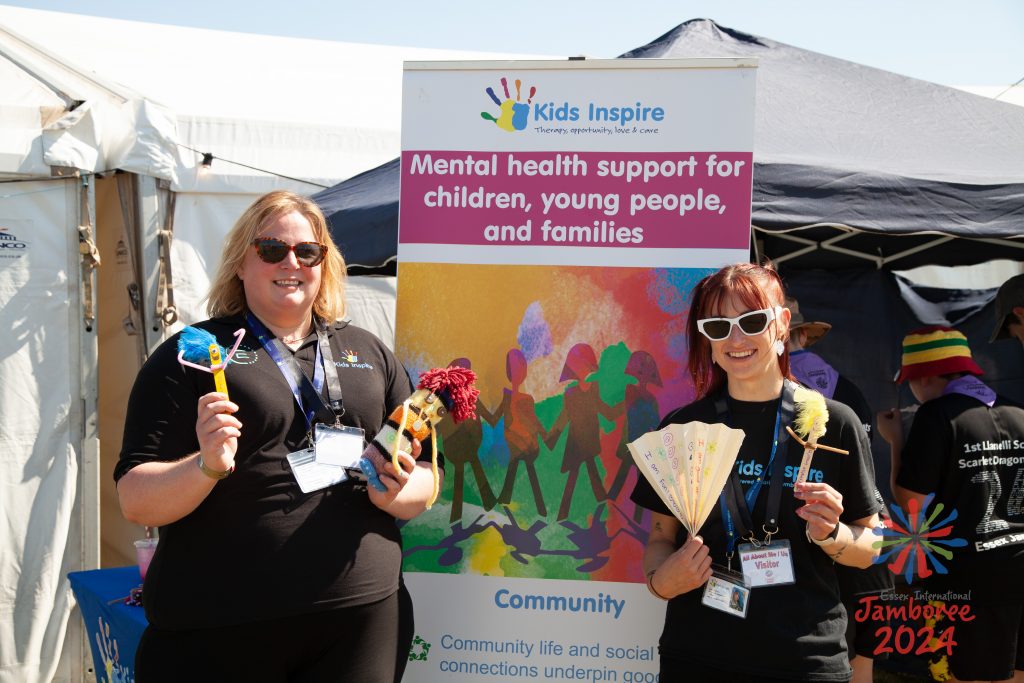 Carla and Romany from Kids Inspire, holding some crafts they brought along for participants to enjoy.