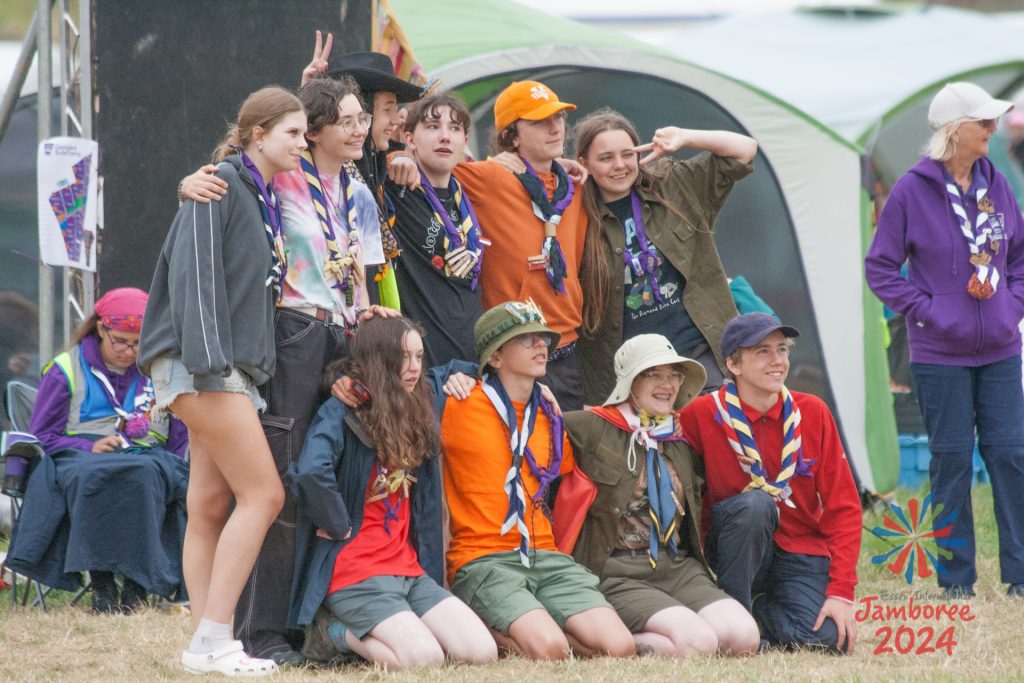 A group of young people posing for a different photo. 