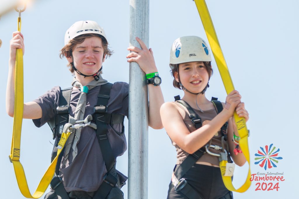 Two Participants take part in a zip line course