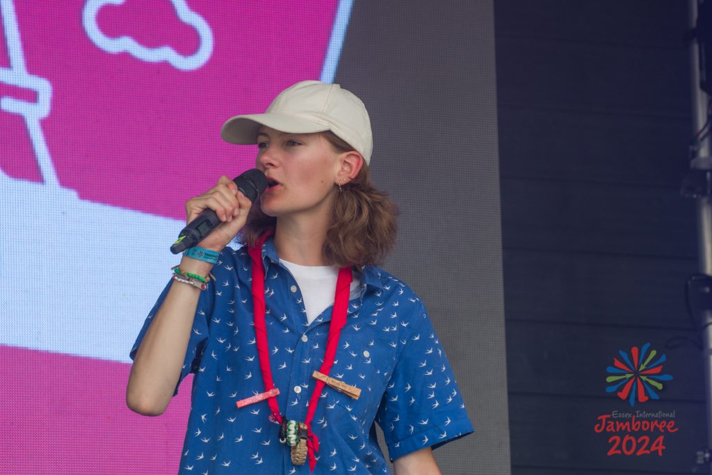 A participant singing into a microphone.