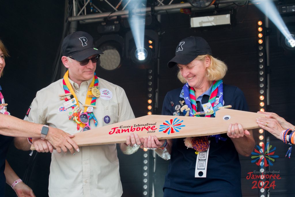 Karen and Paul holding the 2028 Peggy