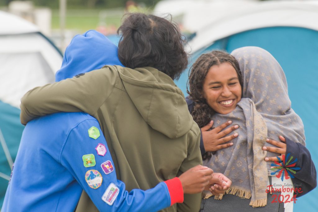 Participants hugging people.