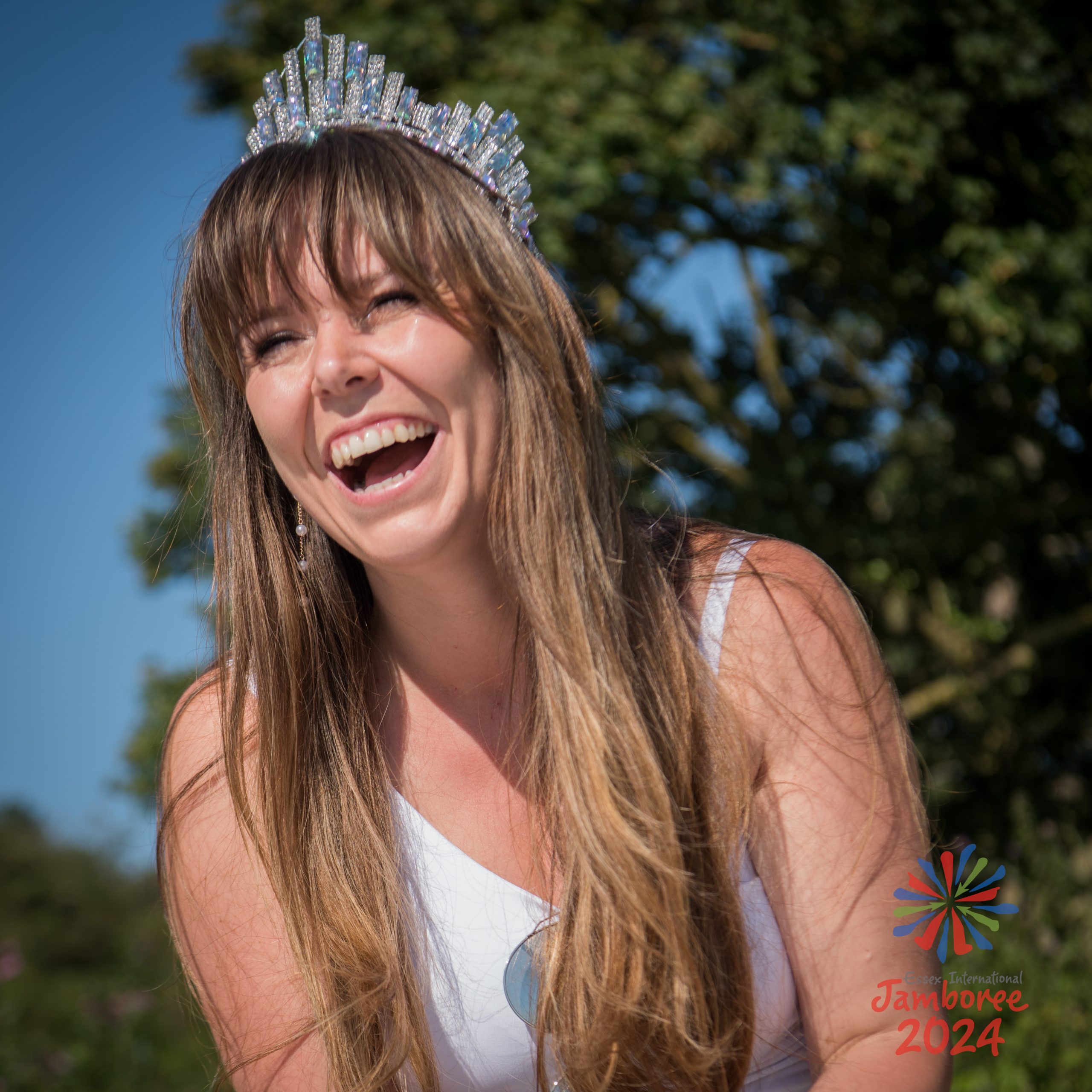 Ms Essex, laughing while wearing her crown.