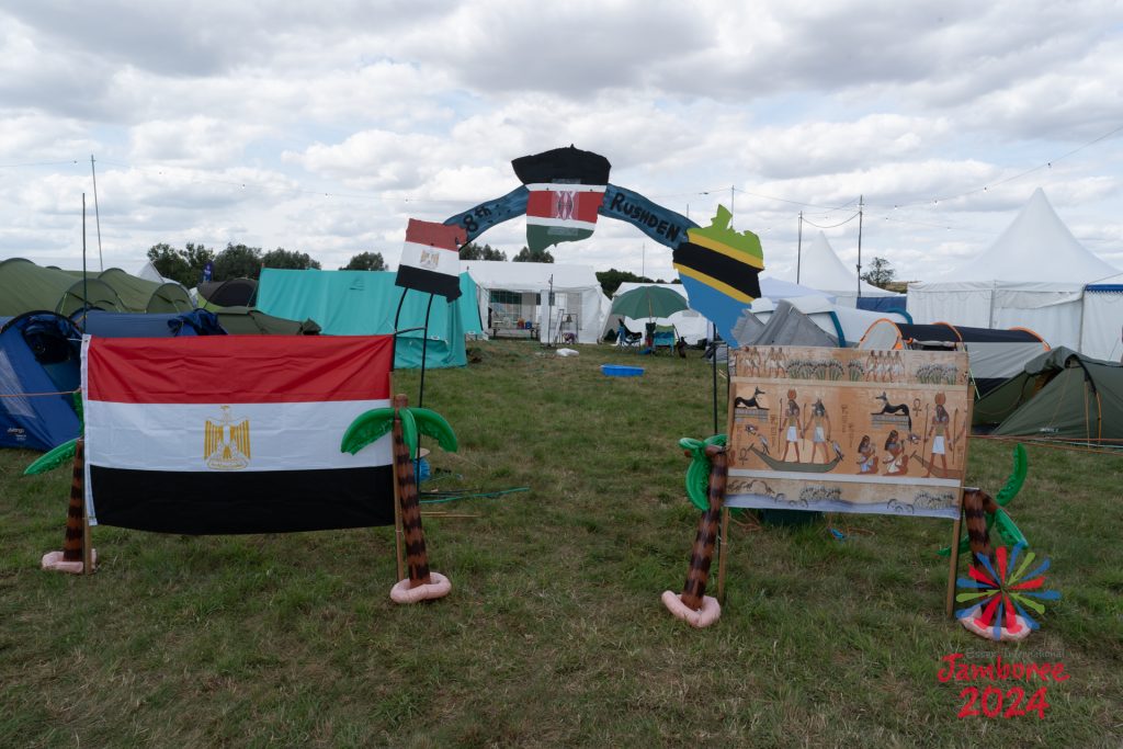 A camp's gateway on Nile subcamp, complete with cutouts and flags of the countries the river passes through.