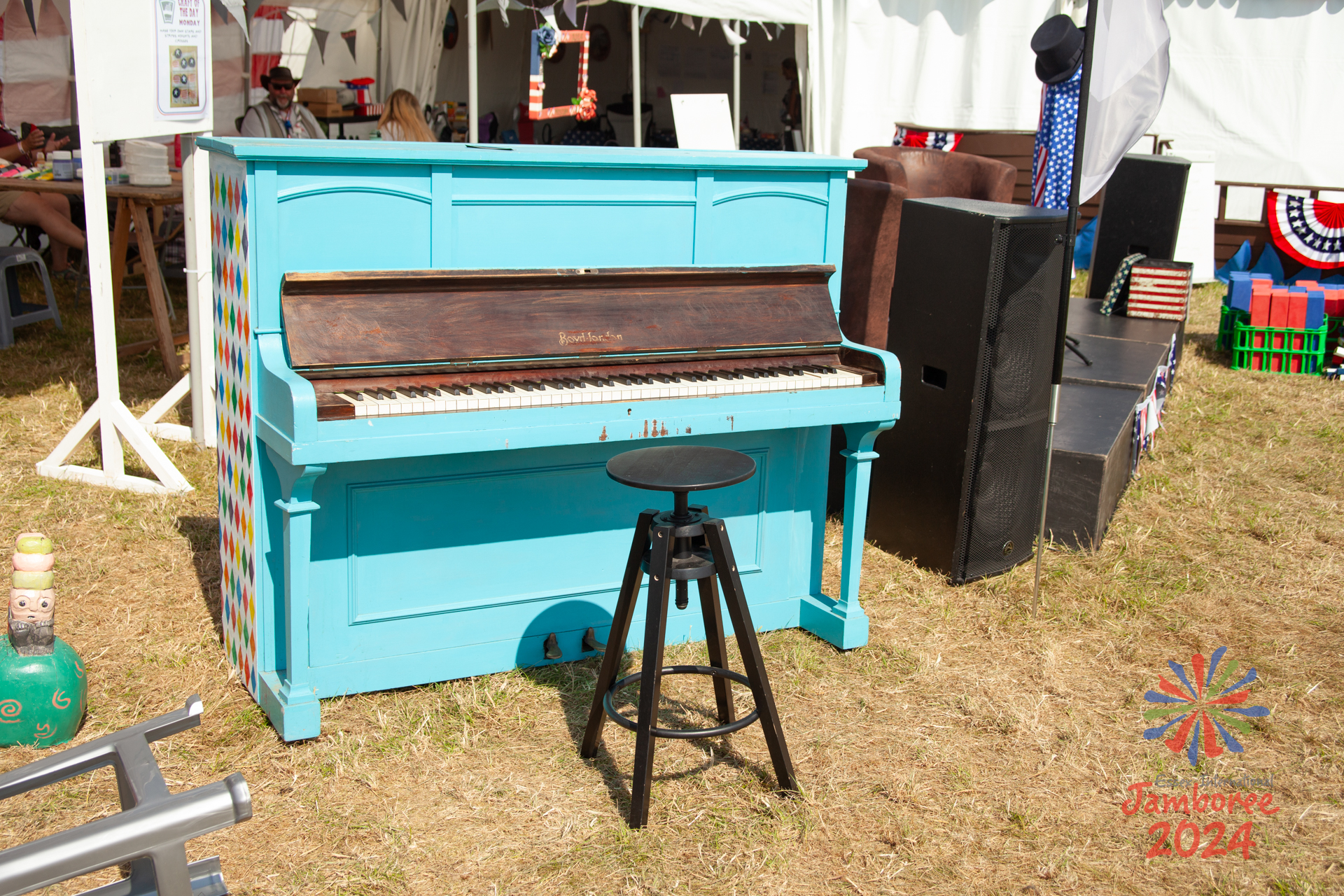 Piano, in a field