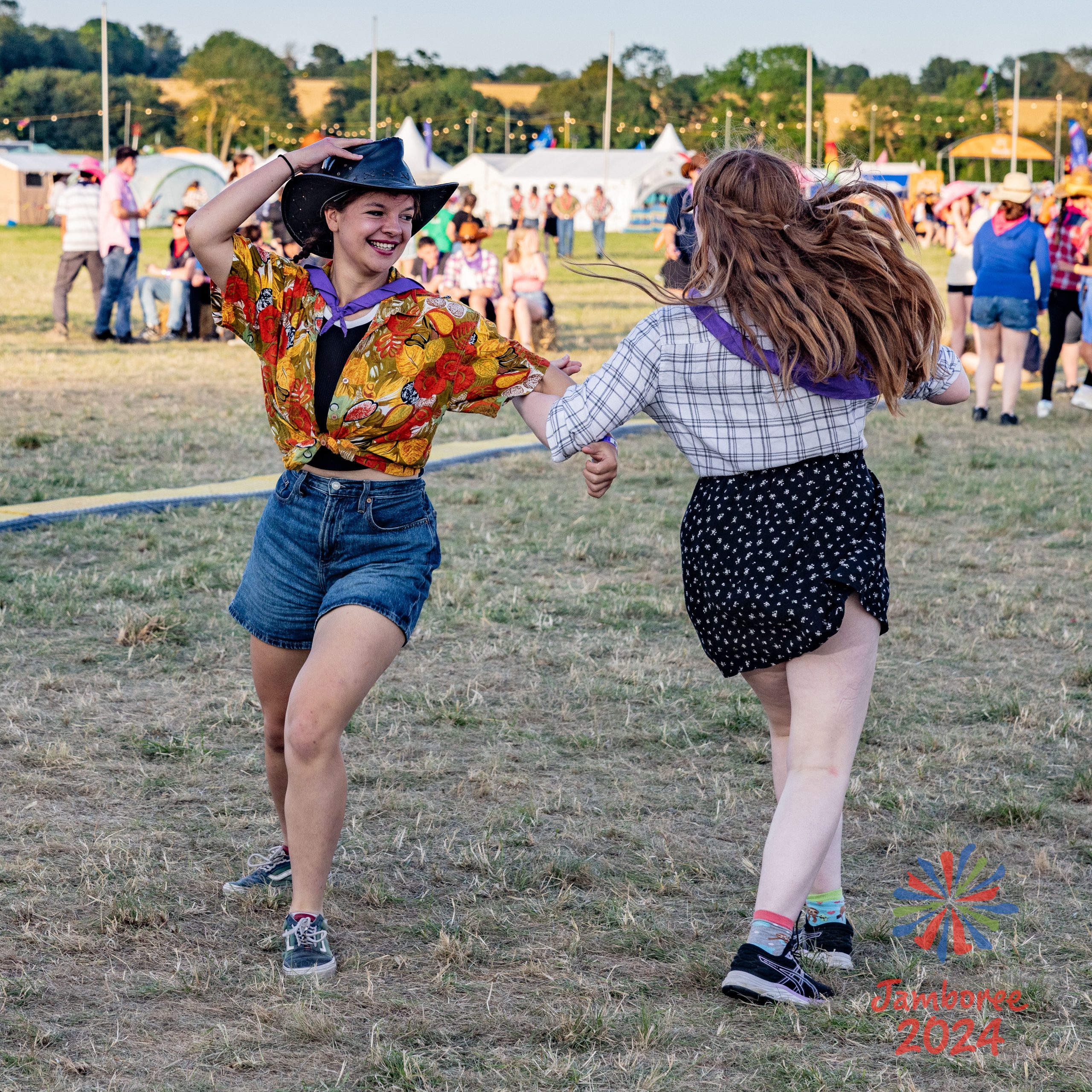 Two girls dancing during the barn dance.