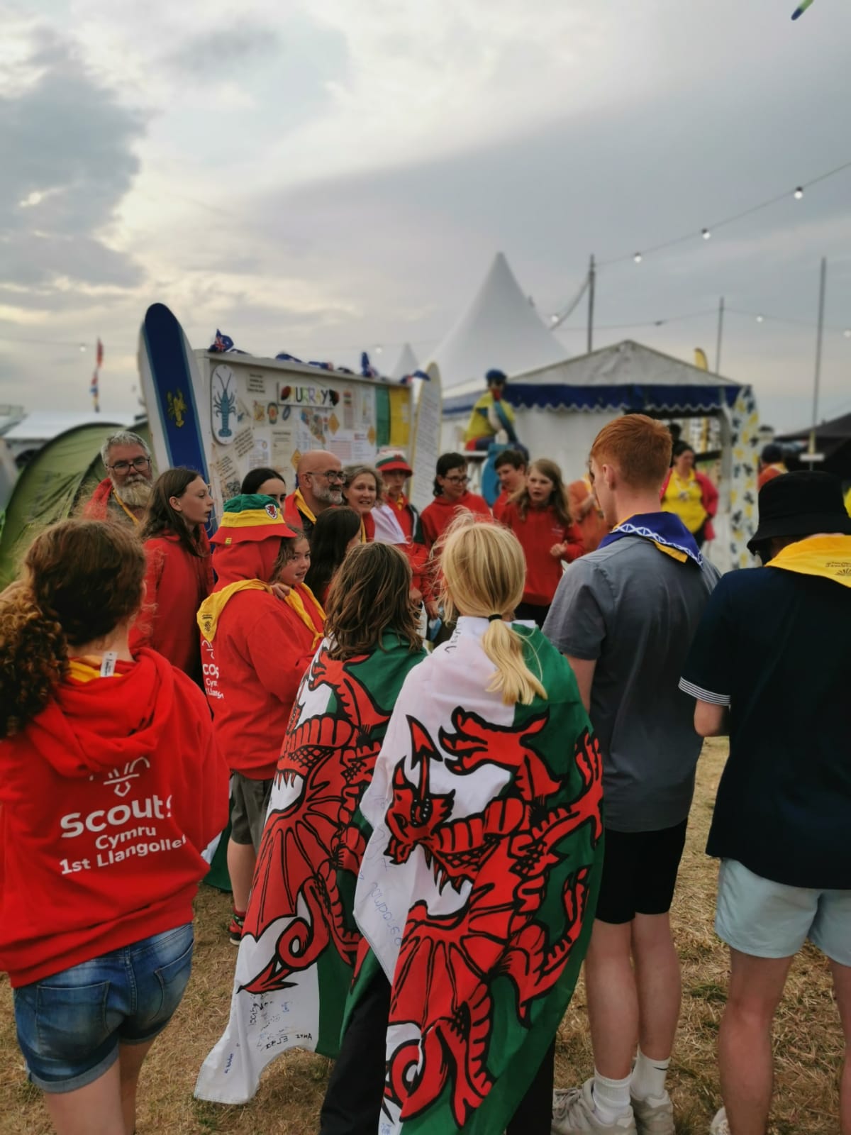 People surrounding the subcamp stage listening to the action.